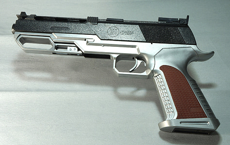 pistol on white surface thumbnail