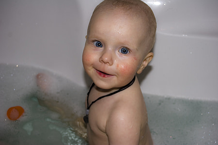 toddler sitting on bathtub thumbnail