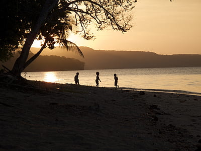 group of children near beach shore thumbnail