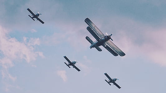 four airplanes flying thumbnail
