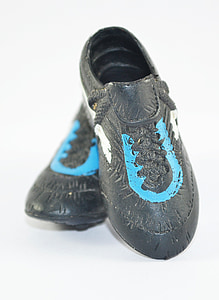 pair of black-and-blue cleat shoes thumbnail