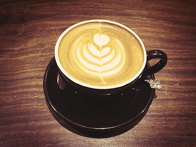 black ceramic teacup with coffee thumbnail