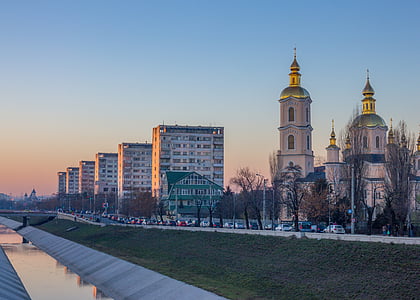 concrete buildings under blue sky at daytime thumbnail