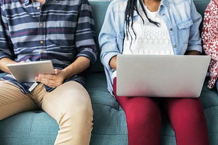 person using silver laptop computer and tablet computer thumbnail