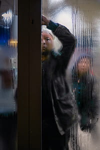 person about to open the glass door thumbnail