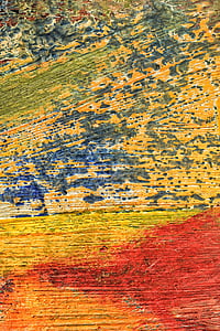 close-up photo of yellow and red painted wall thumbnail