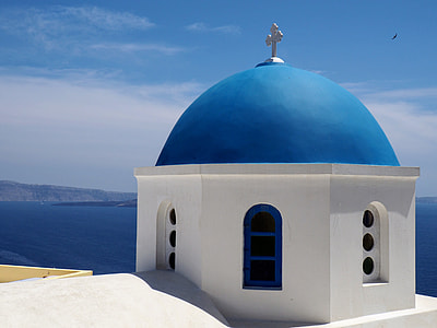 white and blue dome concrete church building near ocean during daytime thumbnail