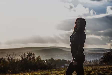 woman standing on grass thumbnail