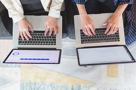 Office Women On Laptop Computers Photo thumbnail