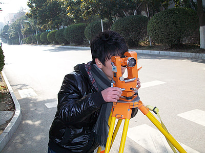 person using theodolite thumbnail