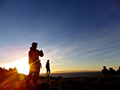 silhouette of group of men during sunset thumbnail