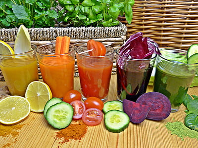 assorted fruit juices on clear drinking glasses thumbnail