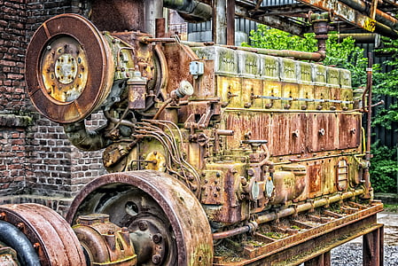 rusty brown engine near wall thumbnail