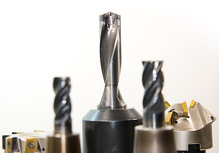 selective focus photography of black drill bits thumbnail