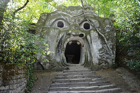 structural shot of gray cave during daytime thumbnail