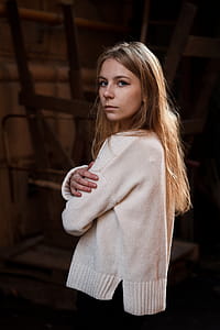 Photo of a Standing Woman with Her Arms Crossed thumbnail