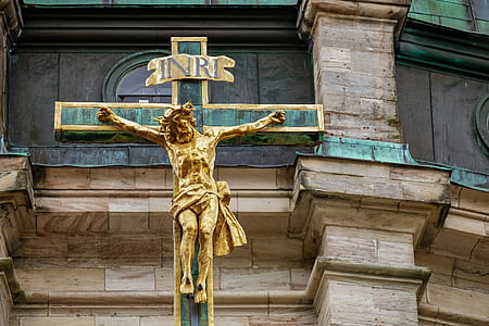 gold-colored and green crucifix thumbnail