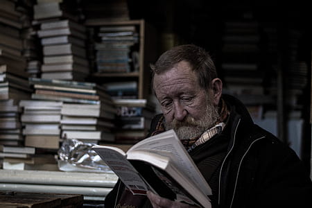 man reading book thumbnail