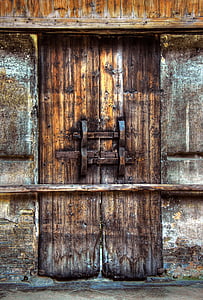 closed brown wooden door thumbnail