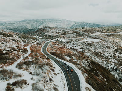 aerial view of road under white sky thumbnail