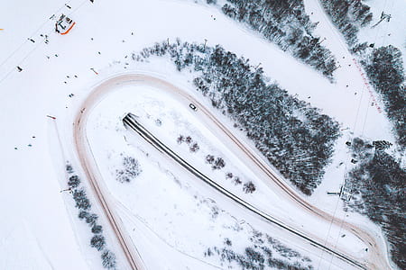bird's eye photography of road covered with snow thumbnail