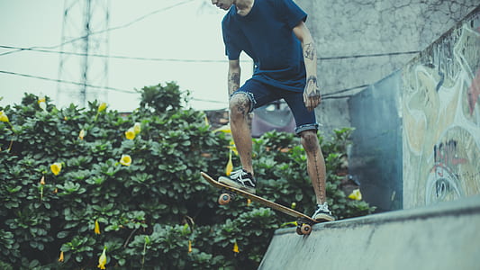 man about to ride skateboard thumbnail