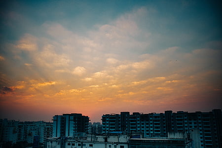 buildings under cloudy sky thumbnail