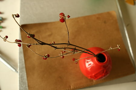 orange vase and red flowers thumbnail