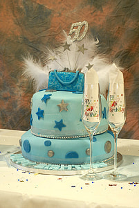 cake and two champagne glasses thumbnail