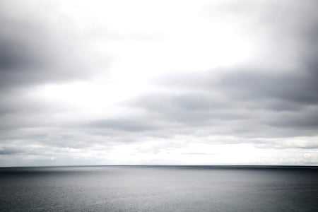 grayscale photo of calm body of water thumbnail