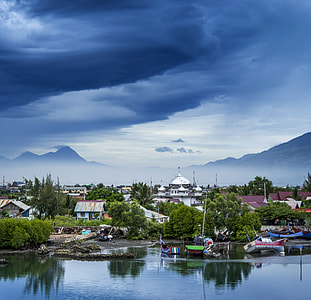 Landscape with clouds and sky with mountains and forests in Indonesia thumbnail
