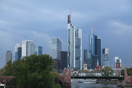 view of cityscape under cloudy sky thumbnail