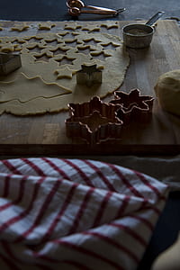 two copper-colored cookie mold near cookie dough thumbnail