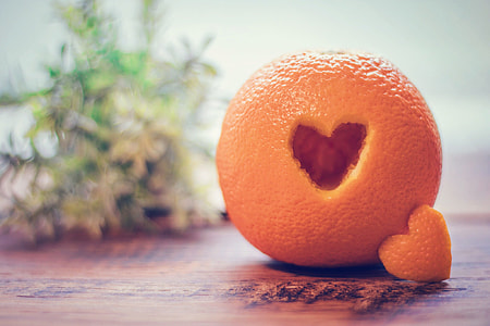 closeup photo of orange fruit carving decor thumbnail