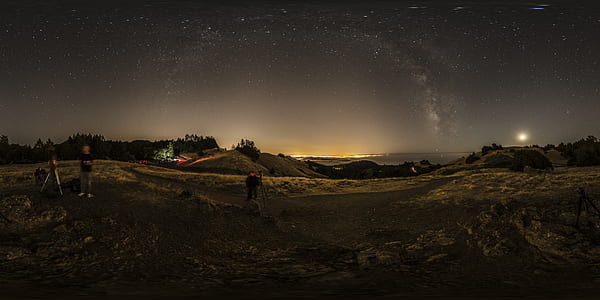 person on field during night time thumbnail