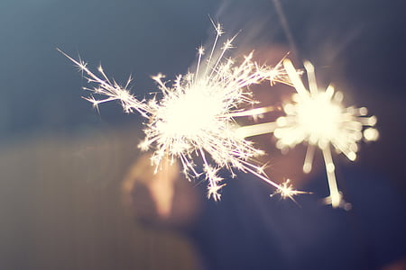 man holding two sparklers thumbnail