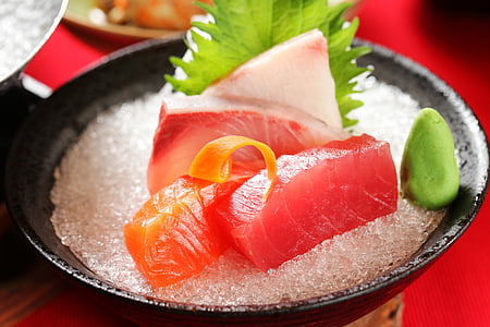 raw fish on bowl of salt thumbnail