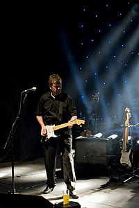 man playing electric guitar thumbnail