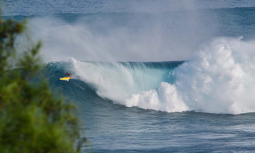 person surfing at the waves thumbnail