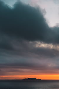 ship sailing during sunset thumbnail