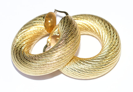 pair of gold-colored earrings thumbnail