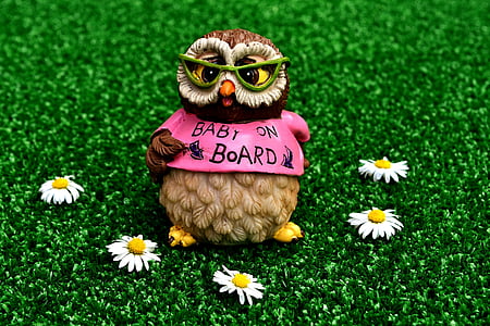 brown owl figurine with daisies thumbnail