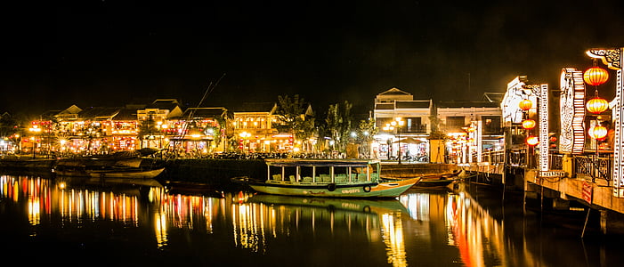 boats park on marina during nighttime thumbnail