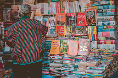 Woman Standing Beside Book Store thumbnail