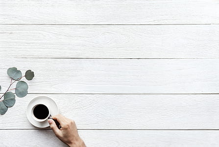 white ceramic cup and saucer thumbnail