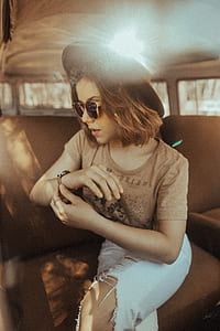 woman in brown shirt fixing her watch thumbnail