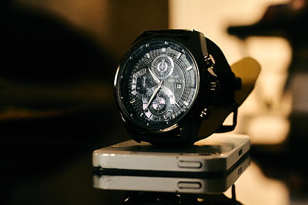 Chronograph Watch on Top of Smartphone thumbnail