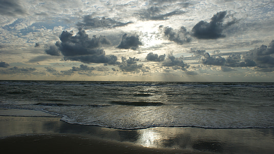 beach under white clouds and blue sky thumbnail