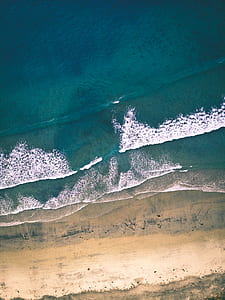aerial photography of seashore thumbnail