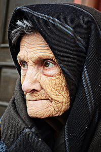 woman in black and gray headscarf thumbnail